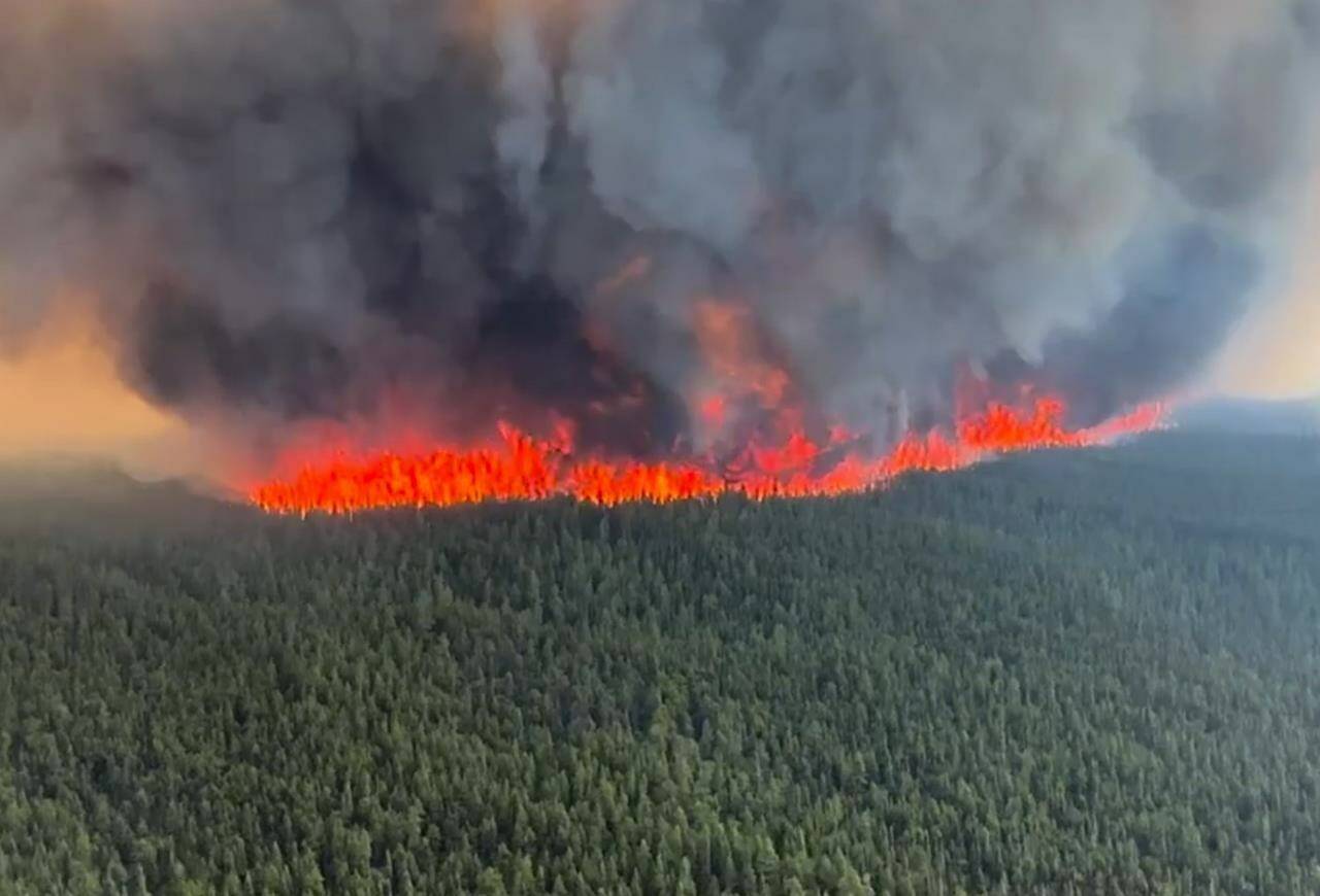 The West Kiskatinaw River wildfire (G70645) burns in the District of Tumbler Ridge, B.C. in this Thursday, June 8, 2023 handout image provided by the BC Wildfire Service. Fire officials are hoping a wind change will help save the community of Tumbler Ridge in northeastern British Columbia, after the wildfire pushed within a few kilometres of the town.THE CANADIAN PRESS/HO, BC Wildfire Service *MANDATORY CREDIT*