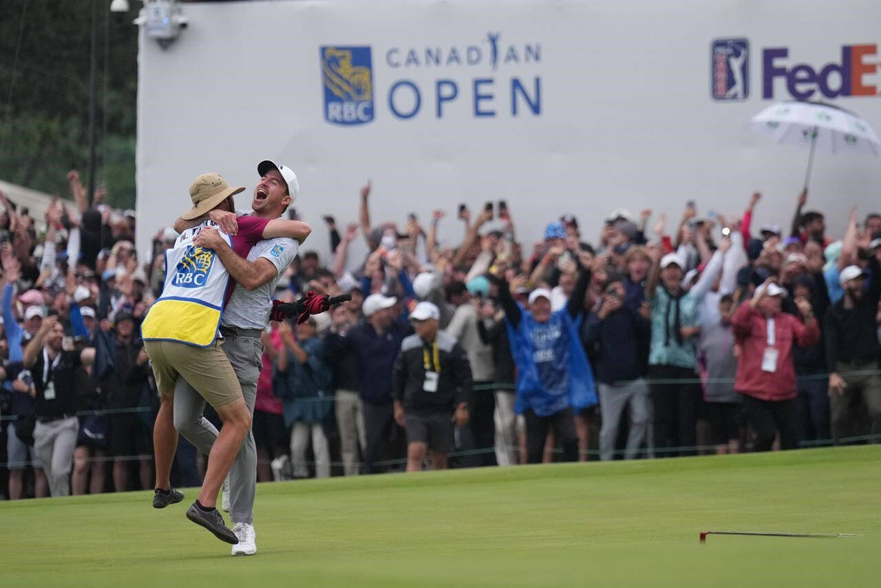 Nick Taylor, of Canada, reacts after winning the Canadian Open championship on the fourth playoff hole against Tommy Fleetwood, of Southport, U.K., in Toronto on Sunday, June 11, 2023. (THE CANADIAN PRESS/Nathan Denette)