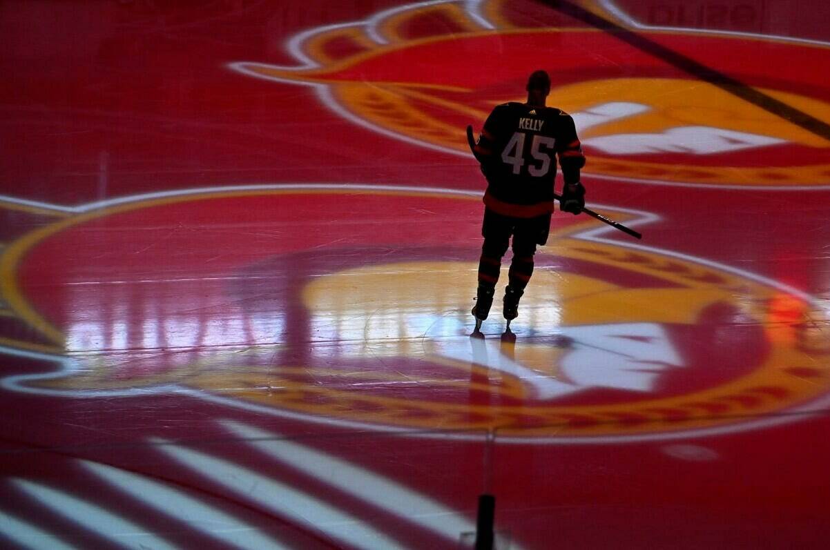 Ottawa Senators left wing Parker Kelly (45) skates as projections of the team’s logo spin on the ice before an NHL game against the Boston Bruins in Ottawa, on Tuesday, Oct. 18, 2022. A group led by Toronto-based businessman Michael Andlauer has reached an agreement in principle to purchase the NHL’s Ottawa Senators for close to $1 billion, according to media reports. THE CANADIAN PRESS/Justin Tang