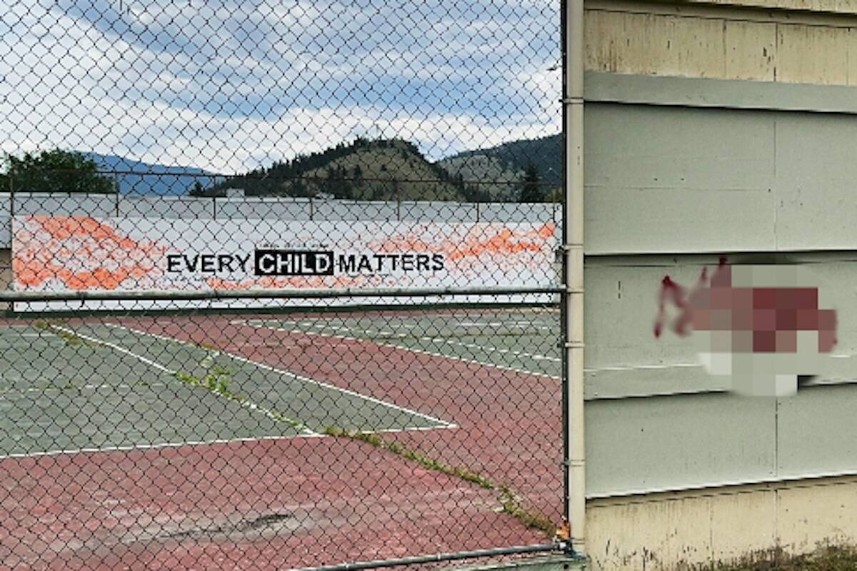 An anti-Black slur was painted on a wall at the tennis courts at Summerland Secondary School, near a mural with a Truth and Reconciliation message. The vandalism was observed in early June. This is not the first incident of graffiti with a racist message left in Summerland. (John Arendt - Summerland Review)