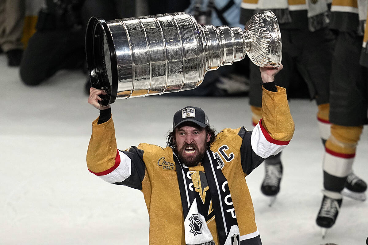Vegas Golden Knights right wing Mark Stone skates with the Stanley Cup after the Knights defeated the Florida Panthers 9-3 in Game 5 of the NHL hockey Stanley Cup Finals Tuesday, June 13, 2023, in Las Vegas. The Knights won the series 4-1. (AP Photo/Abbie Parr)