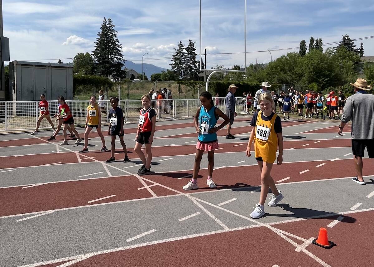 Elementary students line up race at track and field meet held at the Apple Bowl last week. (File photo)