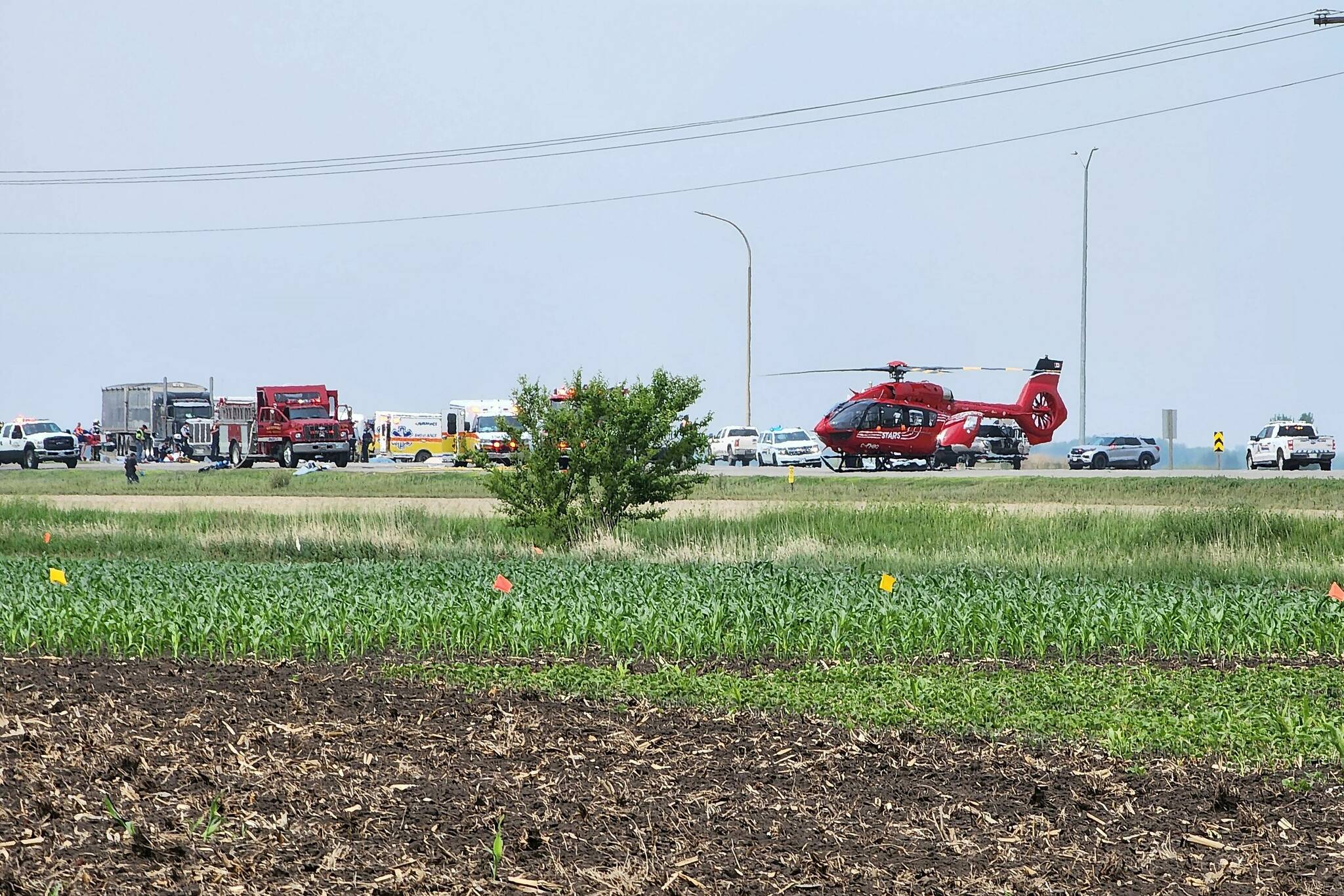 A crash, as shown in this handout image provided by Nirmesh Vadera, has closed a section of the Trans-Canada Highway near Carberry, Manitoba on Thursday June 15, 2023. RCMP have posted on social media that they are on the scene of a very serious collision near the intersection of Highway 1 and Highway 5. THE CANADIAN PRESS/HO-Nirmesh Vadera