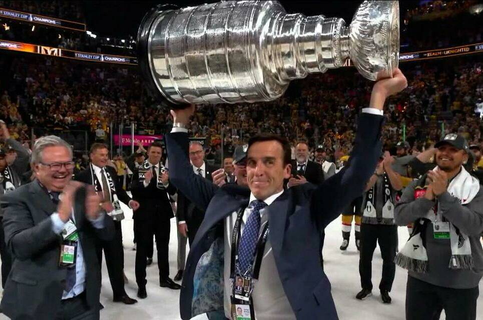 Vegas Golden Knights President of Hockey Operations George McPhee hoists the Stanley Cup. (nhl.com photo)