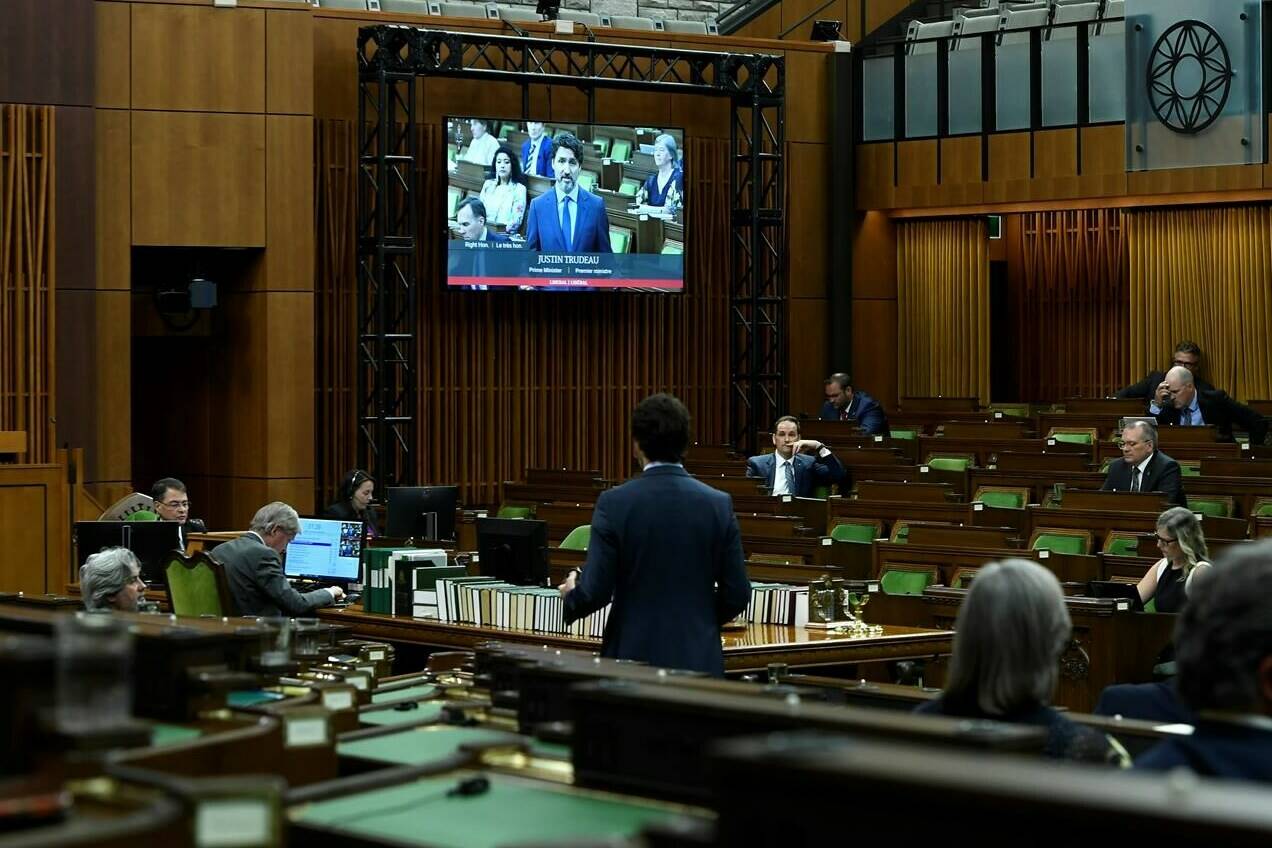 A screen shows Prime Minister Justin Trudeau as he rises during a meeting of the Special Committee on the COVID-19 Pandemic in the House of Commons on Parliament Hill in Ottawa, Wednesday, June 17, 2020. The House of Commons passed a motion Thursday evening to keep hybrid workplace rules adopted during the COVID-19 pandemic. THE CANADIAN PRESS/Justin Tang