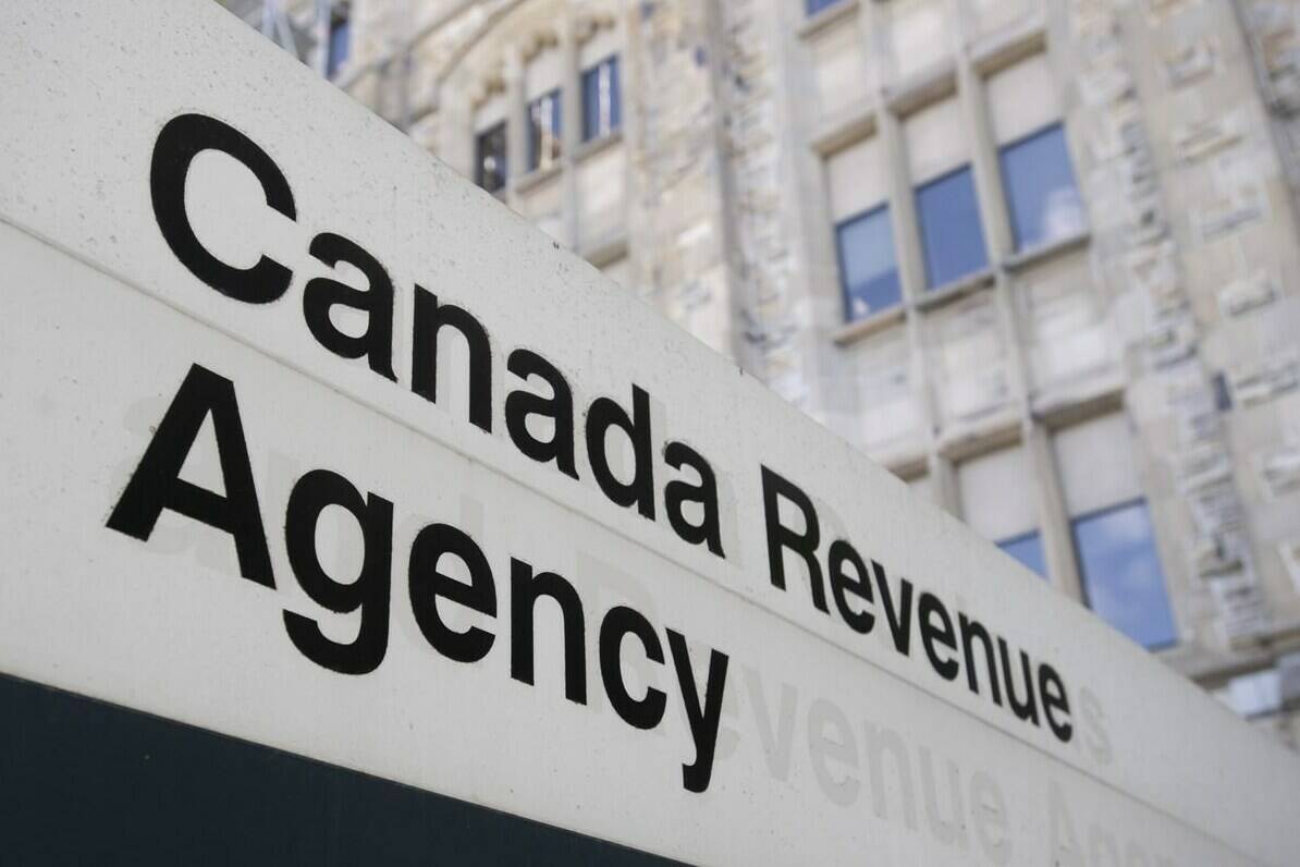 A sign outside the Canada Revenue Agency is seen Monday May 10, 2021 in Ottawa. Canada’s largest federal public-sector union says more than 155,000 workers have ratified new four-year deals with the federal government. THE CANADIAN PRESS/Adrian Wyld