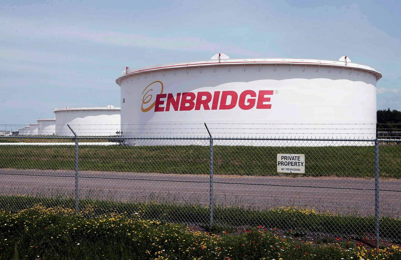 This June 29, 2018 photo shows tanks at the Enbridge Energy terminal in Superior, Wisconsin. A U.S. judge has ordered Enbridge Inc. to pay an Indigenous band in Wisconsin US$5.1 million and to remove the Line 5 pipeline from its property within three years. THE CANADIAN PRESS/AP-Jim Mone