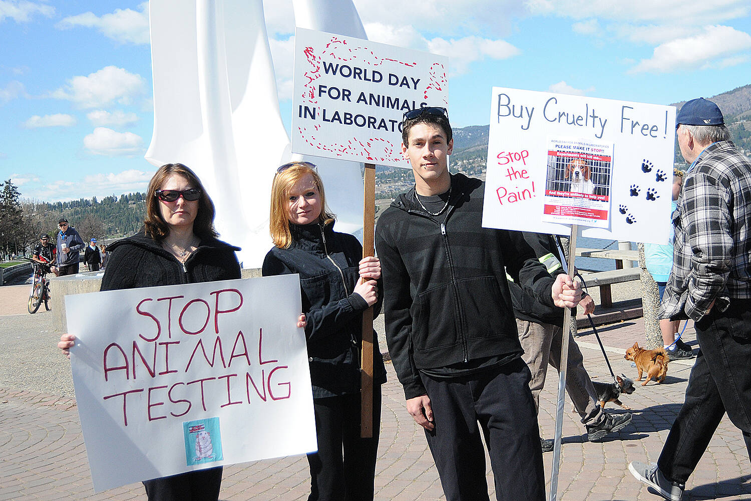 FILE - Nancy Miljour, from left, Rachael Elgie and Reggie Dewdney were among those in downtown Kelowna in in 2018 supporting a demonstration by the Kelowna chapter of the Animal Defense and Anti-Vivisection Society of B.C. The society opposes the use of animals for medical experimentation and scientific research. -(Warren Henderson/Capital News)