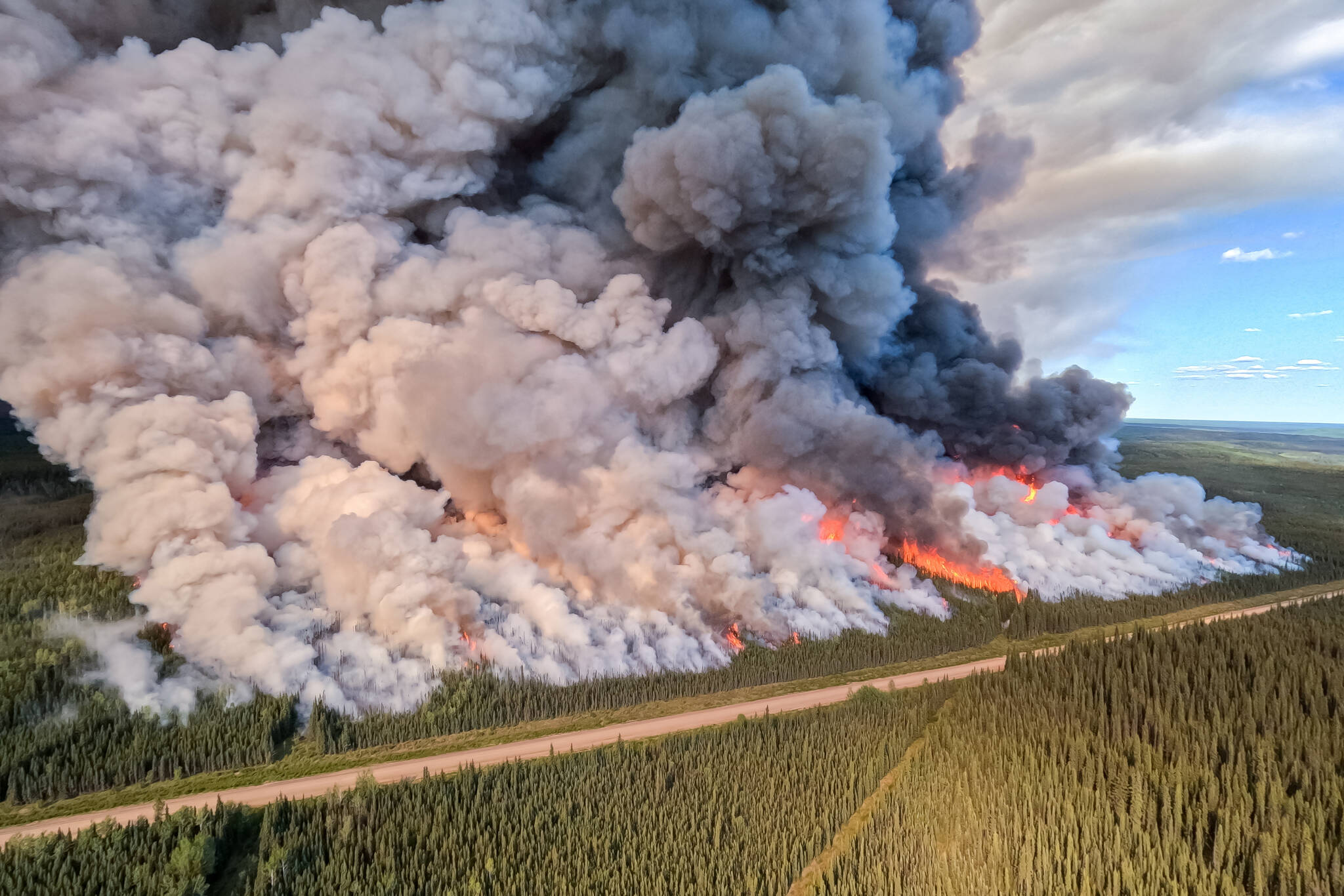 The Donnie Creek wildfire burns in an area between Fort Nelson and Fort St. John, B.C. in this undated handout photo provided by the BC Wildfire Service. THE CANADIAN PRESS/HO-BC Wildfire Service