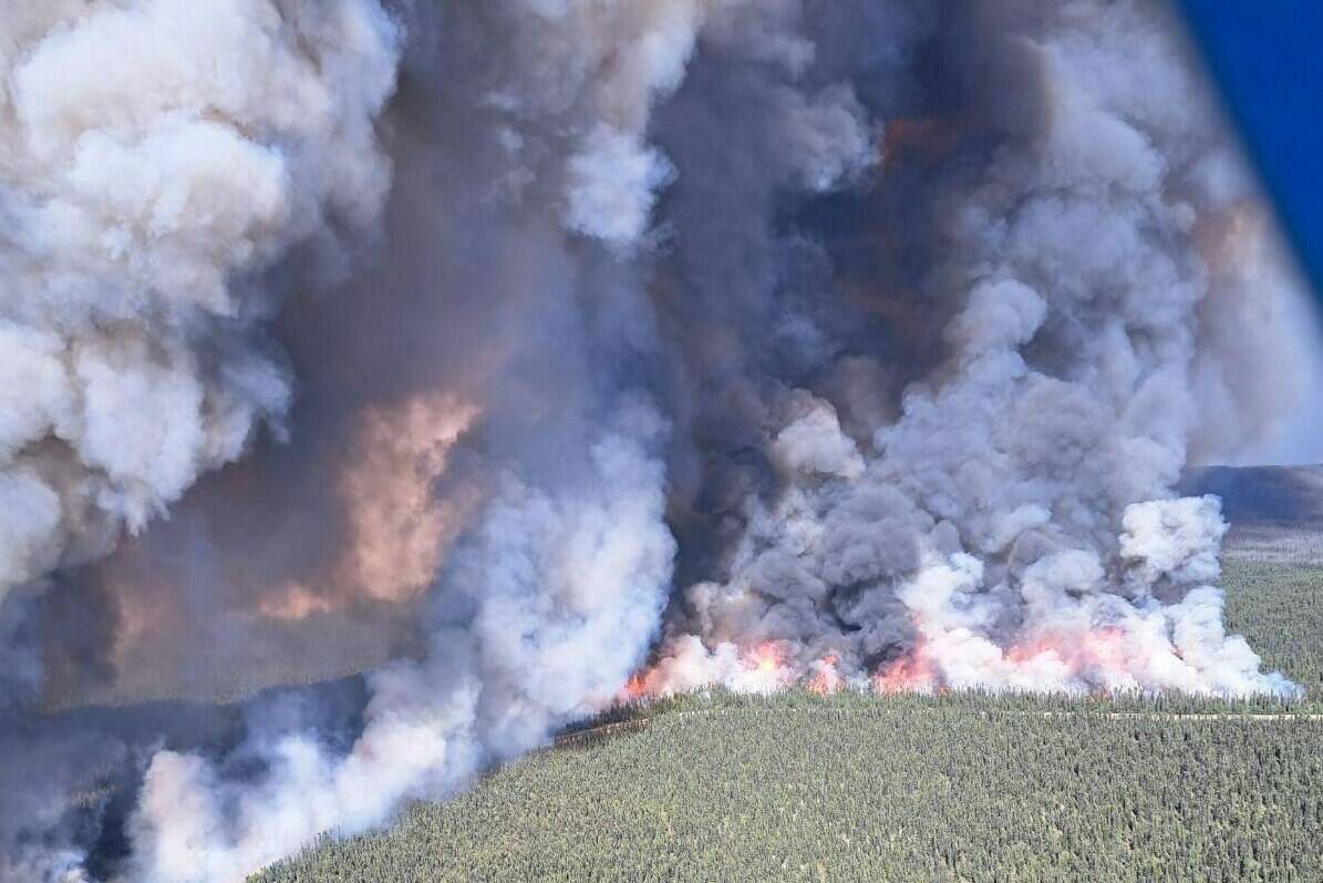 The Donnie Creek wildfire near Trutch, B.C. is shown in a handout photo. More than 200 wildfires are still burning out of control in Canada this morning as the country’s record-setting forest fire season continues to raze thousands of square kilometres every day. THE CANADIAN PRESS/HO-Facebook-BC Wildfire Service