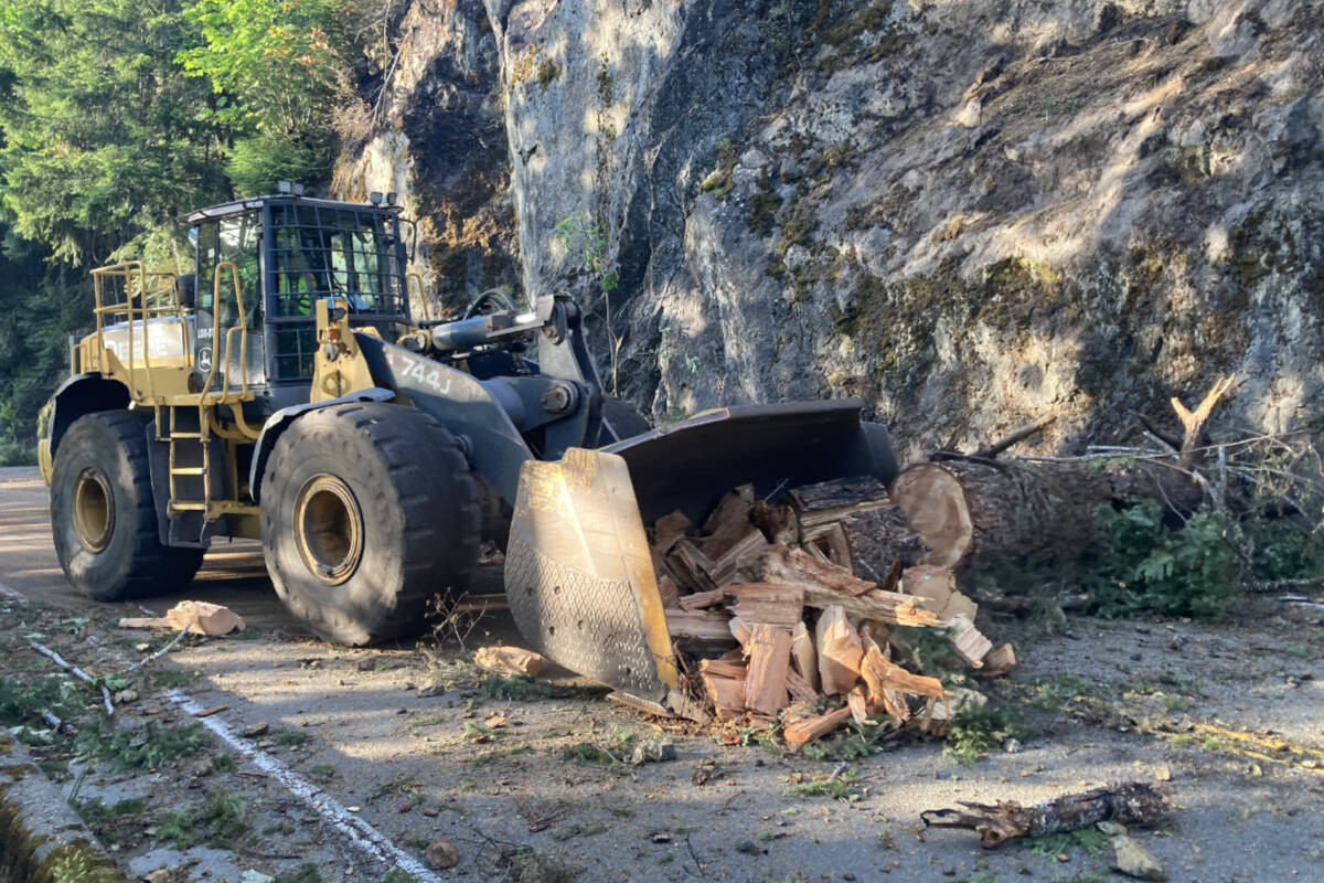 Highway crews remove rocks, trees and other debris from Highway 4. (PHOTO COURTESY MINISTRY OF TRANSPORTATION AND INFRASTRUCTURE)