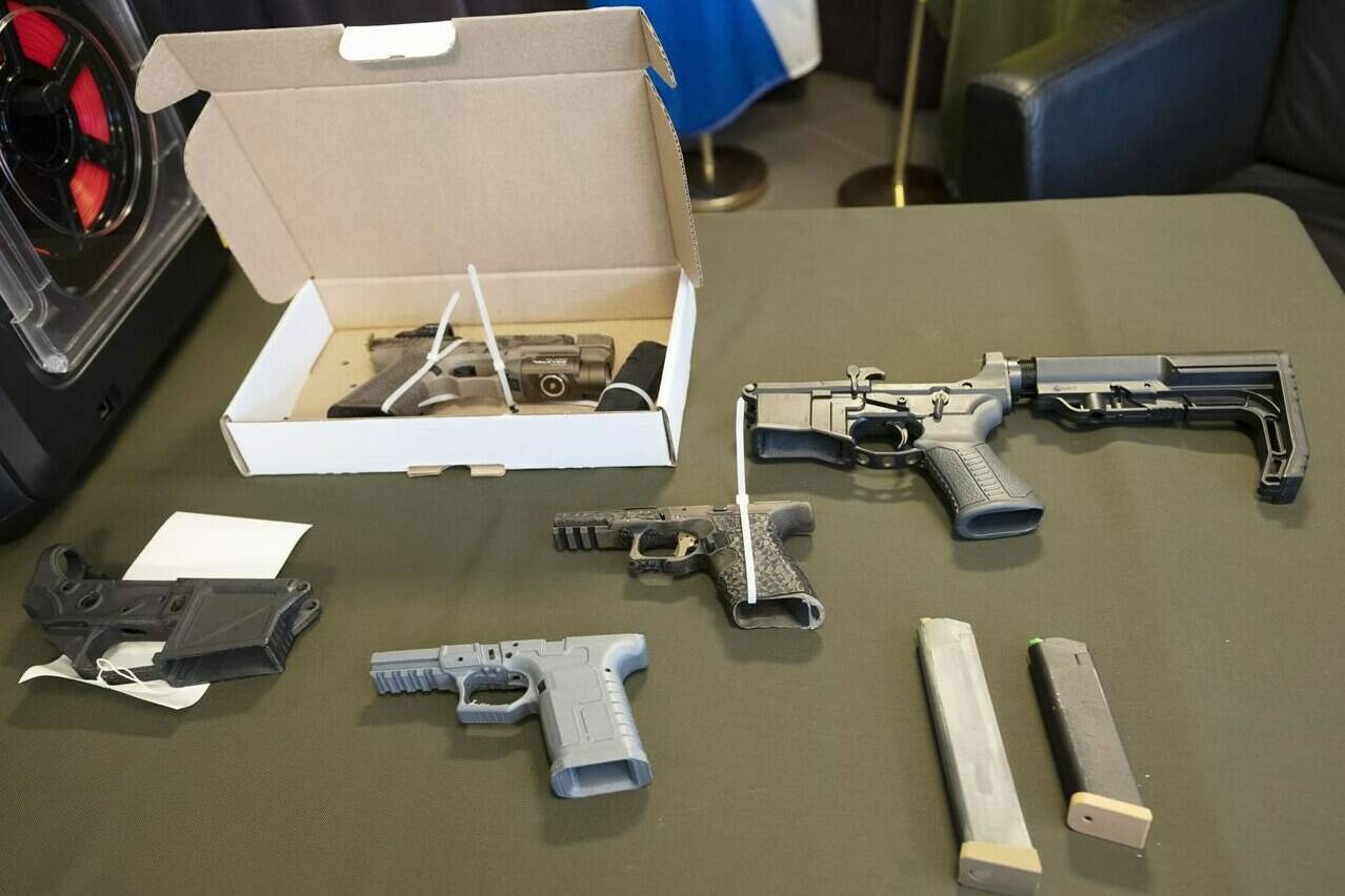 Some of the 3D printed ghost guns seized in Operation Centaure are displayed during a news conference in Montreal, Wednesday, June 21, 2023. The multi force operation seized 440 guns including 71 3D printed ghost guns across Canada.THE CANADIAN PRESS/Ryan Remiorz