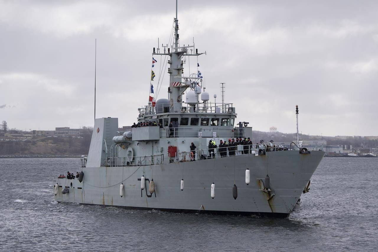 HMCS Glace Bay in Halifax Harbour during the ship’s homecoming in Halifax on Friday, March 31, 2023. As the search for a missing submersible with five people aboard continues about 700 kilometres south of Newfoundland, two federal cabinet ministers came forward today to say the focus in on saving lives, not on the cost of the rescue operation. THE CANADIAN PRESS/Darren Calabrese