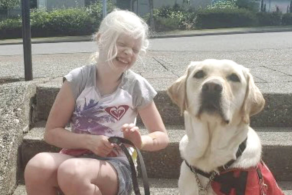 Sophia, seen here with her service dog Fresca, will get to go with her fellow Grade 6 students on a field trip to the water park at Cultus Lake after the Langley School District rescinded a decision excluding the special needs student citing ‘WorkSafe’ issues. (Special to Langley Advance Times)
