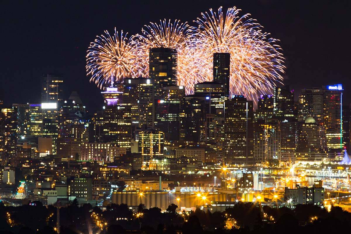 Seen from Burnaby Mountain approximately 16 kilometres away, fireworks explode behind the downtown Vancouver skyline as a pyrotechnic team from Croatia closes out the final night of the Honda Celebration of Light, in Vancouver, on Saturday August 3, 2019. Vancouver has made the Economist Intelligence Unit’s 2023 Global Liveability Index for the second year in a row. THE CANADIAN PRESS/Darryl Dyck