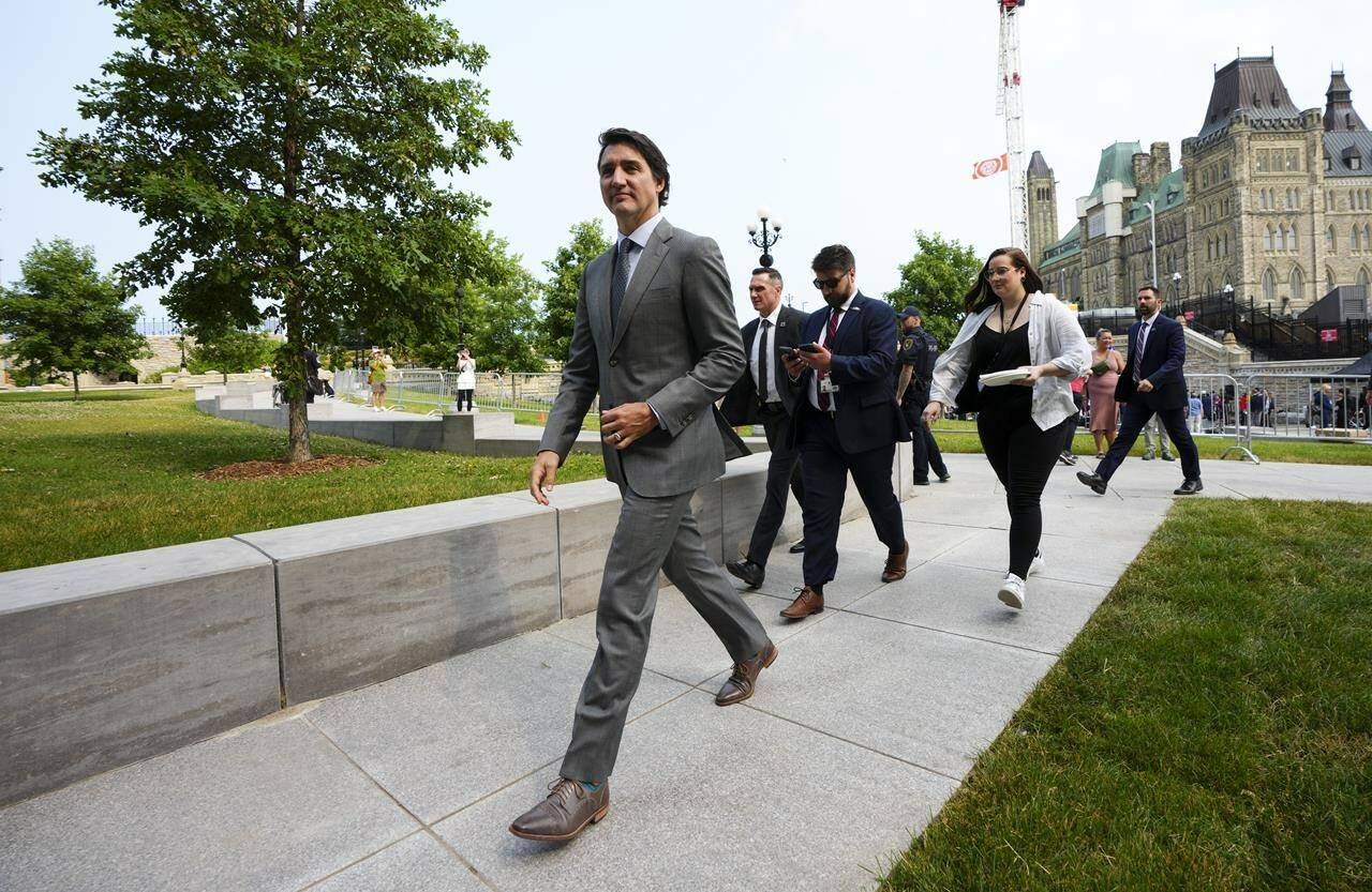 Prime Minister Justin Trudeau makes his way into the West Block on Parliament Hill in Ottawa on Wednesday, June 21, 2023. Prime Minister Justin Trudeau says Canada’s incident response group is meeting Saturday (June 24) to discuss the latest developments in Russia. THE CANADIAN PRESS/Sean Kilpatrick