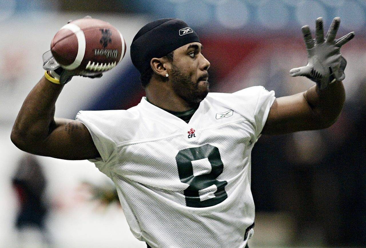 Edmonton running back Dahrran Diedrick tosses the ball during a practice Friday, Nov. 25, 2005 in Vancouver. Former CFL and NFL running back Dahrran Diedrick has died, the Montreal Alouettes announced Saturday. THE CANADIAN PRESS/Chuck Stoody