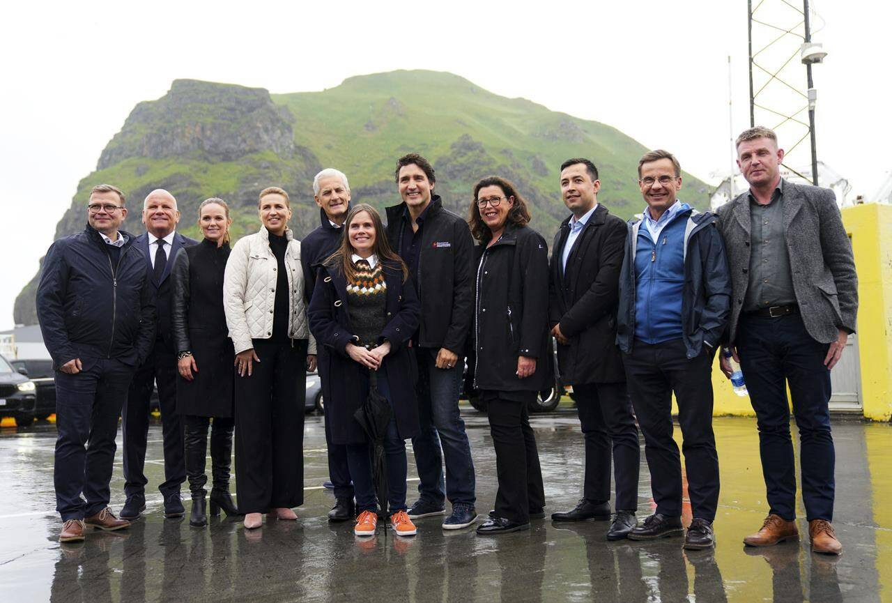Prime Minister Justin Trudeau joins fellow Nordic leaders to take part in a photo in Vestmannaeyjar, Iceland, Sunday, June 25, 2023. Sweden’s bid to join the NATO military alliance will be discussed today at a meeting of Nordic leaders in Iceland with Trudeau in attendance. THE CANADIAN PRESS/Sean Kilpatrick