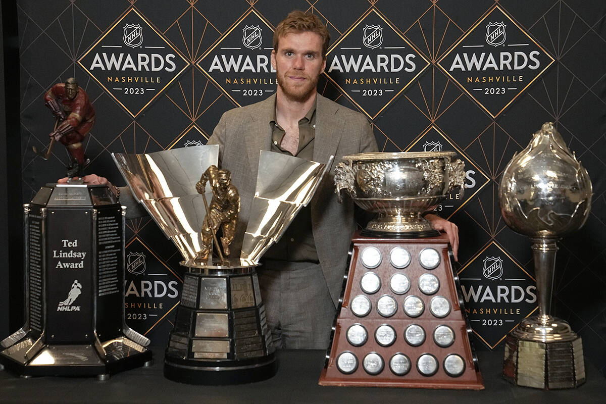 Edmonton Oilers hockey player Connor McDavid poses with the Ted Lindsey Award, the Maurice ‘Rocket’ Richard Trophy, the Art Ross Trophy and the Hart Memorial Trophy at the NHL Awards, Monday, June 26, 2023, in Nashville, Tenn. (AP Photo/George Walker IV)