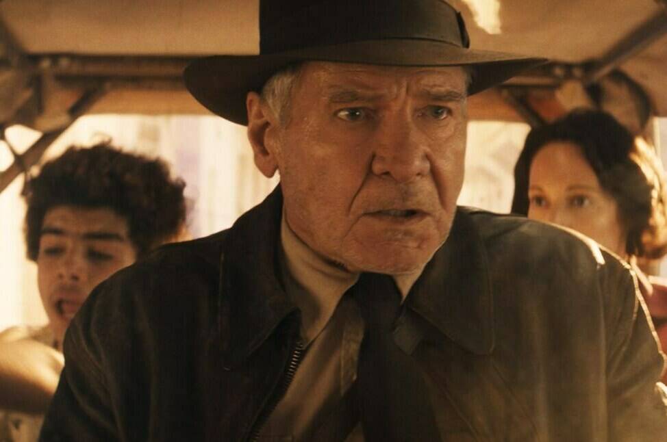 This image released by Lucasfilm shows Ethann Isidore, from left, Harrison Ford and Phoebe Waller-Bridge in a scene from “Indiana Jones and the Dial of Destiny.” (Lucasfilm Ltd. via AP)