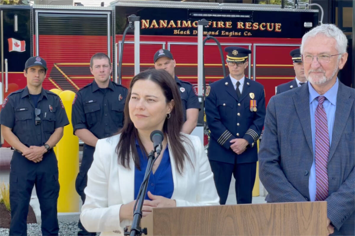 Nanaimo-Ladysmith MP Lisa Marie Barron and Nanaimo Mayor Leonard Krog discuss details of Bill C-345, which aims to improve protection against violence for all first responders, during a press conference at Nanaimo Fire Rescue Station No. 1 on Wednesday, June 28. (Chris Bush/News Bulletin)