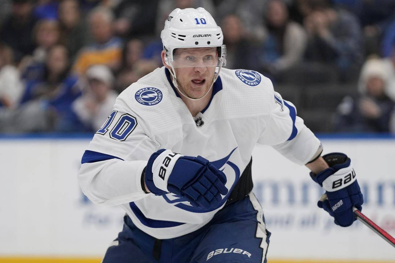 FILE - Tampa Bay Lightning’s Corey Perry plays during the third period of an NHL hockey game against the St. Louis Blues Saturday, Jan. 14, 2023, in St. Louis. The Chicago Blackhawks continued surrounding their youth-laden and Connor Bedard-headed rebuild with yet another experienced veteran by acquiring forward Corey Perry in a trade with Tampa Bay on Thursday, June 29. (AP Photo/Jeff Roberson, File)