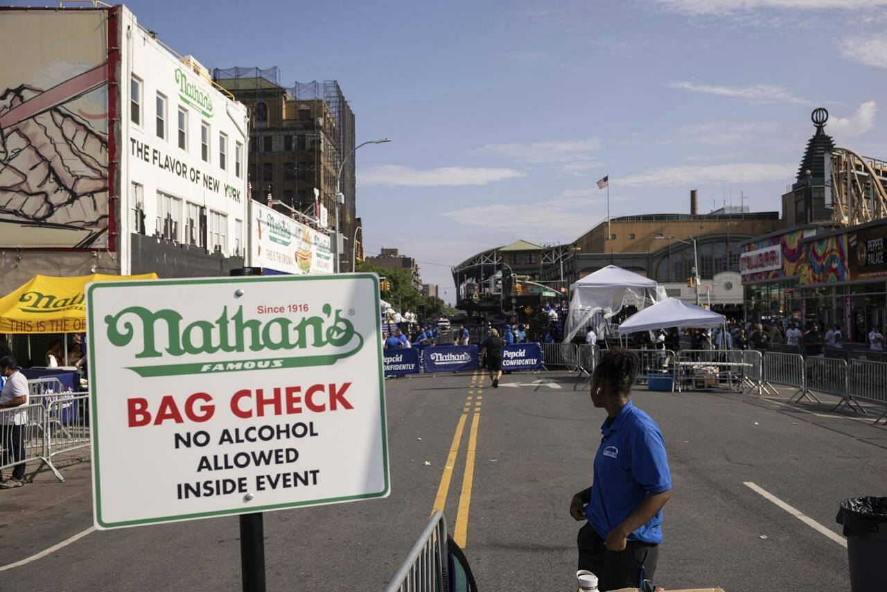 A general view shows the 2023 Nathan’s Famous Fourth of July hot dog eating contest in the Coney Island section of the Brooklyn borough of New York, Tuesday, July 4, 2023. (AP Photo/Yuki Iwamura)