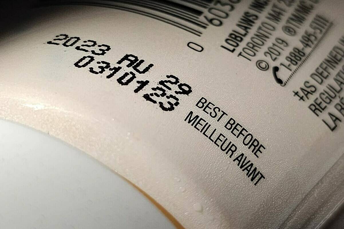 A “best before” date is shown on a food container in Toronto, Tuesday, July 4, 2023. A report from a House committee is recommending the government take another look at its rules around best before dates in an effort to cut down on food waste. THE CANADIAN PRESS/Giordano Ciampini