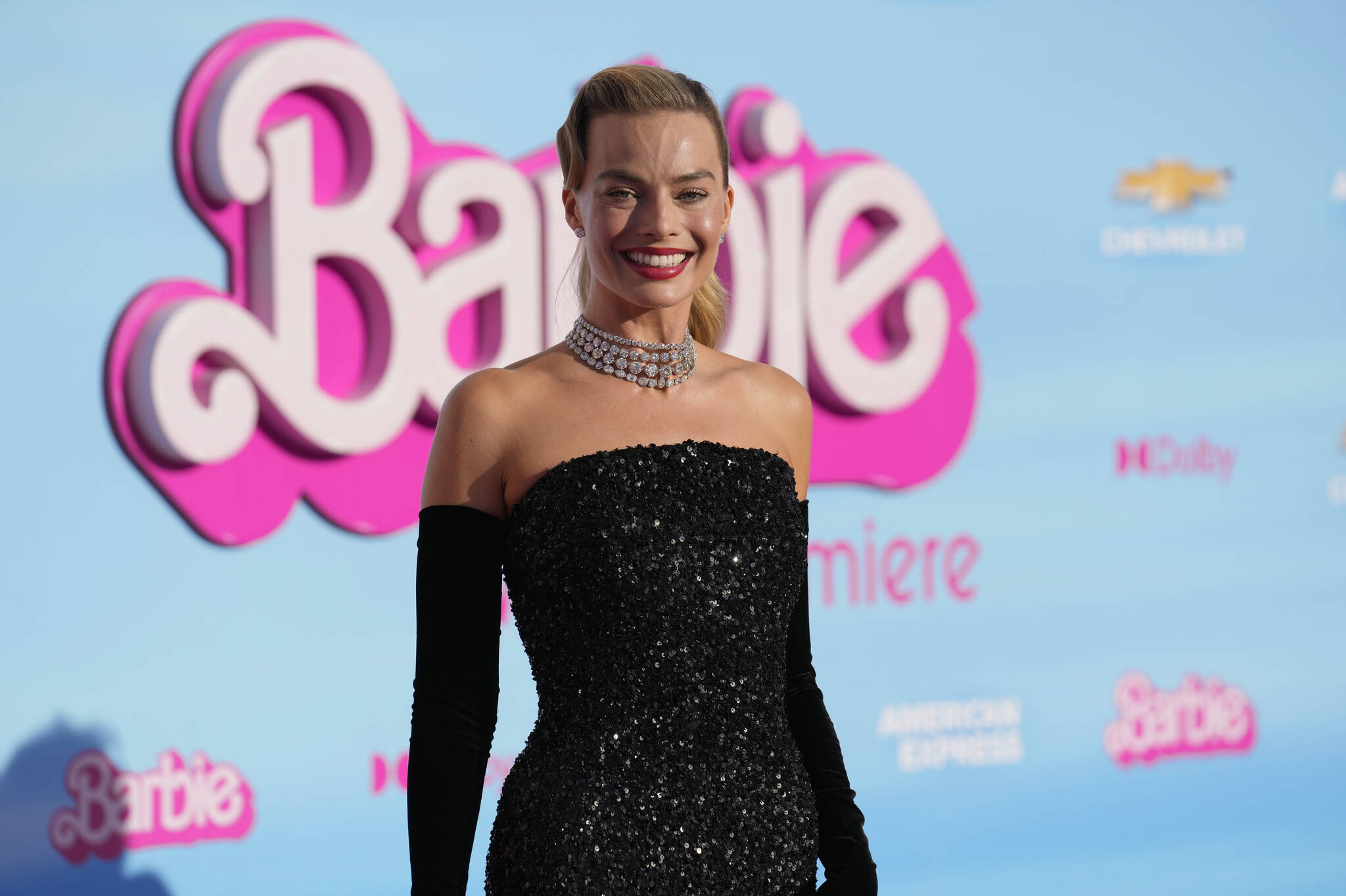 Margot Robbie arrives at the premiere of "Barbie" on Sunday, July 9, 2023, at The Shrine Auditorium in Los Angeles. (AP Photo Chris Pizzello)