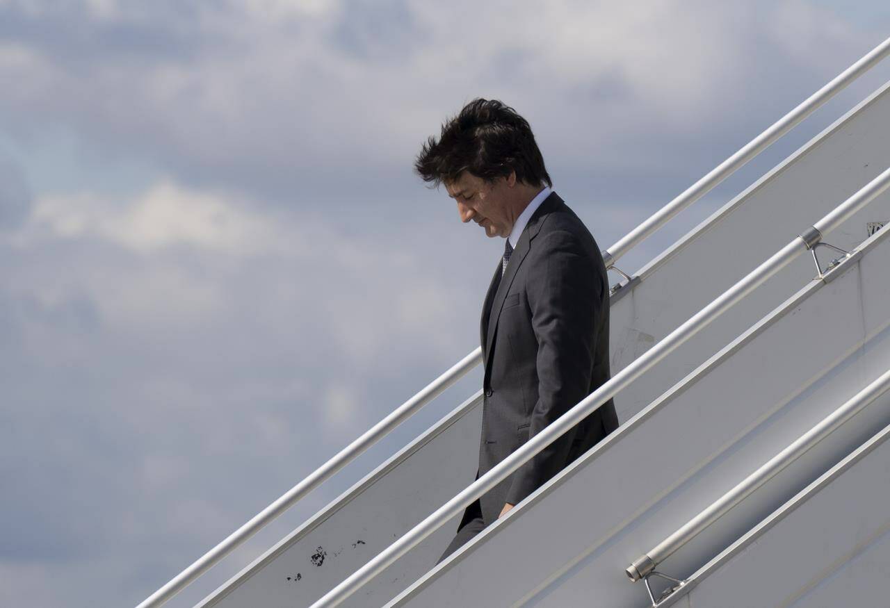 Prime Minister Justin Trudeau arrives at the airport, Monday, July 10, 2023 in Riga, Latvia. THE CANADIAN PRESS/Adrian Wyld