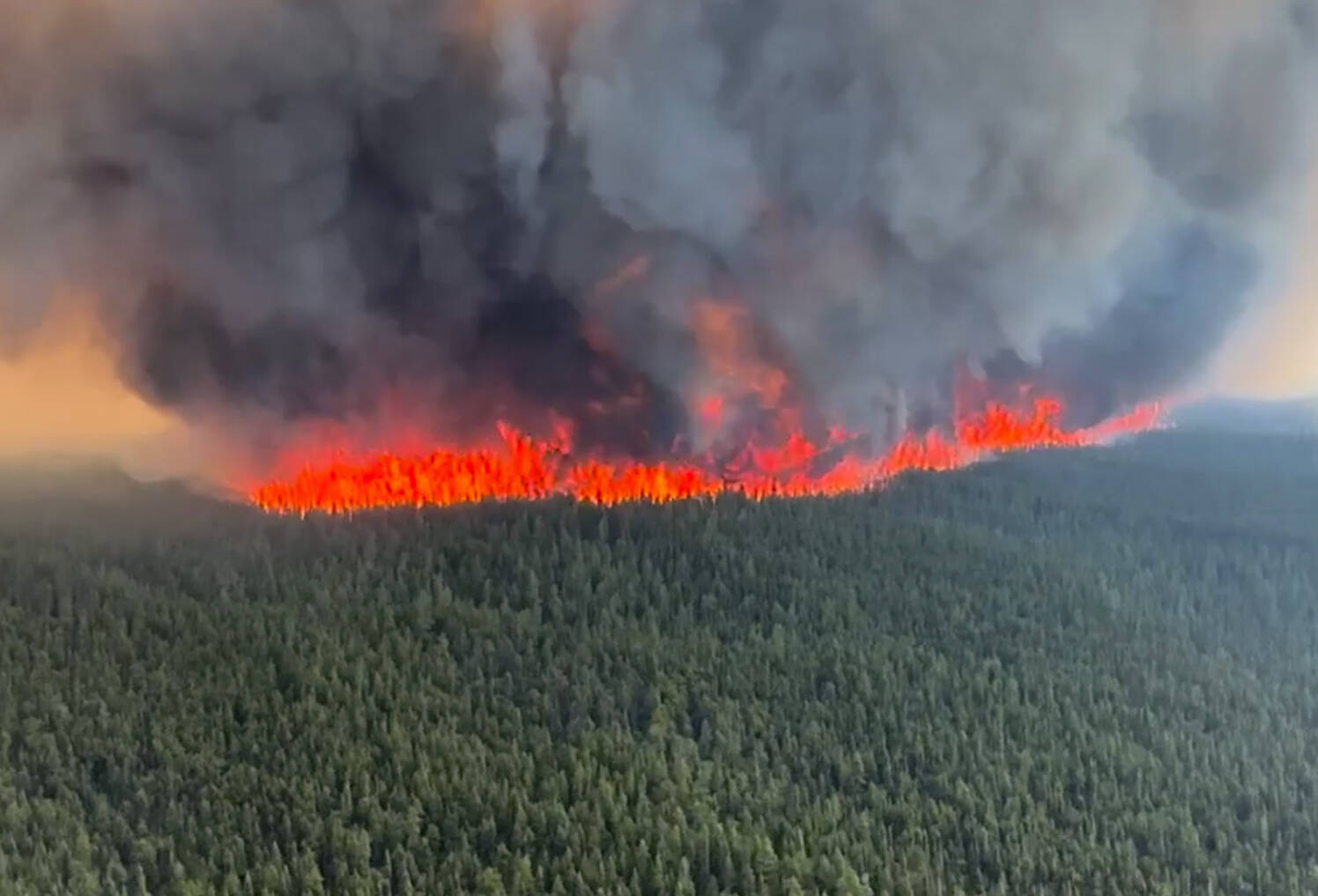 The West Kiskatinaw River wildfire (G70645) burns in the District of Tumbler Ridge, B.C. in this Thursday, June 8, 2023 handout image provided by the BC Wildfire Service. THE CANADIAN PRESS/HO, BC Wildfire Service *MANDATORY CREDIT*