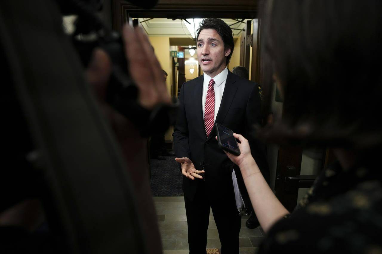 Prime Minister Justin Trudeau speaks to reporters in the foyer of the House of Commons on Parliament Hill in Ottawa on Tuesday, June 20, 2023. Ottawa’s corporate-ethics watchdog is set to announce investigations into whether Canadian companies are importing products made through human-rights abuses in China, a move advocates have sought for years. THE CANADIAN PRESS/Sean Kilpatrick