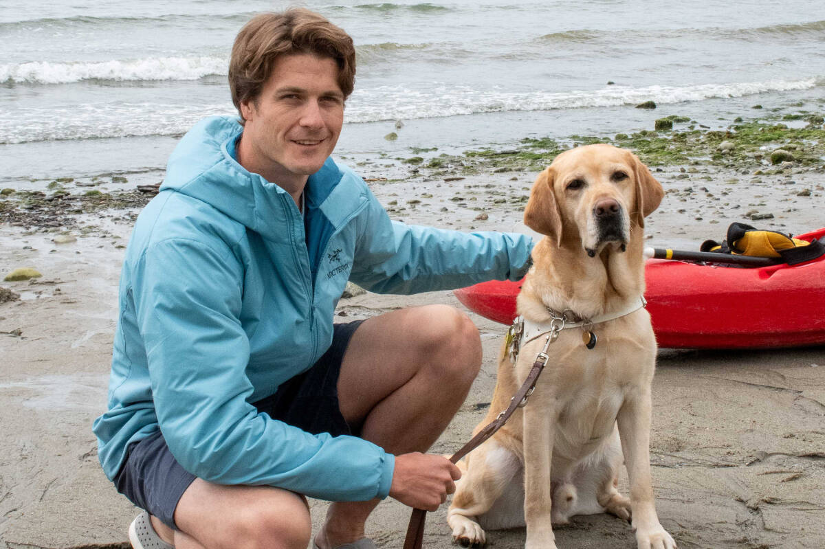 Scott Rees, 29, with his guide dog Kaleb, plans to swim across the Georgia Strait on July 22 to raise money for Canadian Dogs for the Blind. (Photo submitted)
