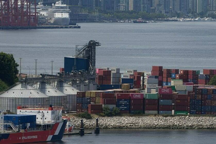 Stacks of cargo containers are seen at port during a strike by International Longshore and Warehouse Union Canada workers in the province, in Vancouver, on Wednesday, July 12, 2023. THE CANADIAN PRESS/Darryl Dyck