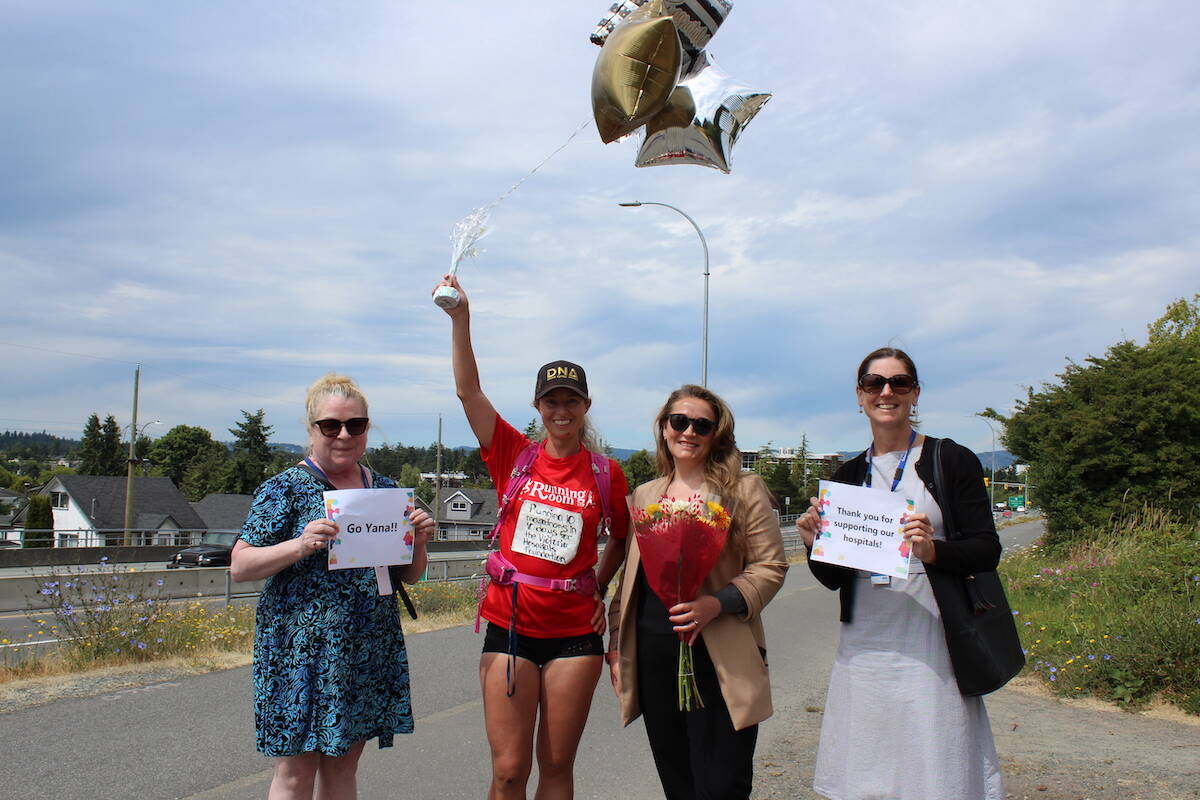 Barb West, Yana Hempler, Danielle Mulligan and Heather Crow pose for a photo at the day 10 finish line. (Natasha Baldin/News Staff)