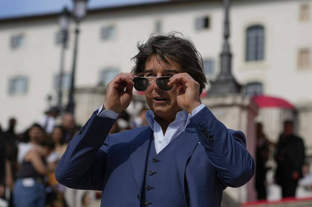Actor Tom Cruise poses for photographers on the red carpet of the world premiere for the movie “Mission: Impossible - Dead Reckoning” at the Spanish Steps in Rome Monday, June 19, 2023. (AP Photo/Alessandra Tarantino)