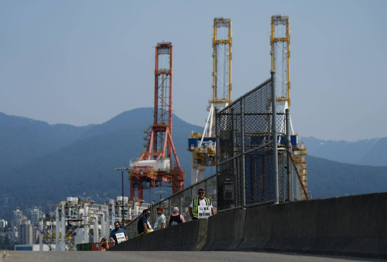 Premier David Eby says he wants a rapid solution to finally bring about labour peace at ports in B.C., but warned against legislating longshore workers back to work. (THE CANADIAN PRESS/Darryl Dyck)