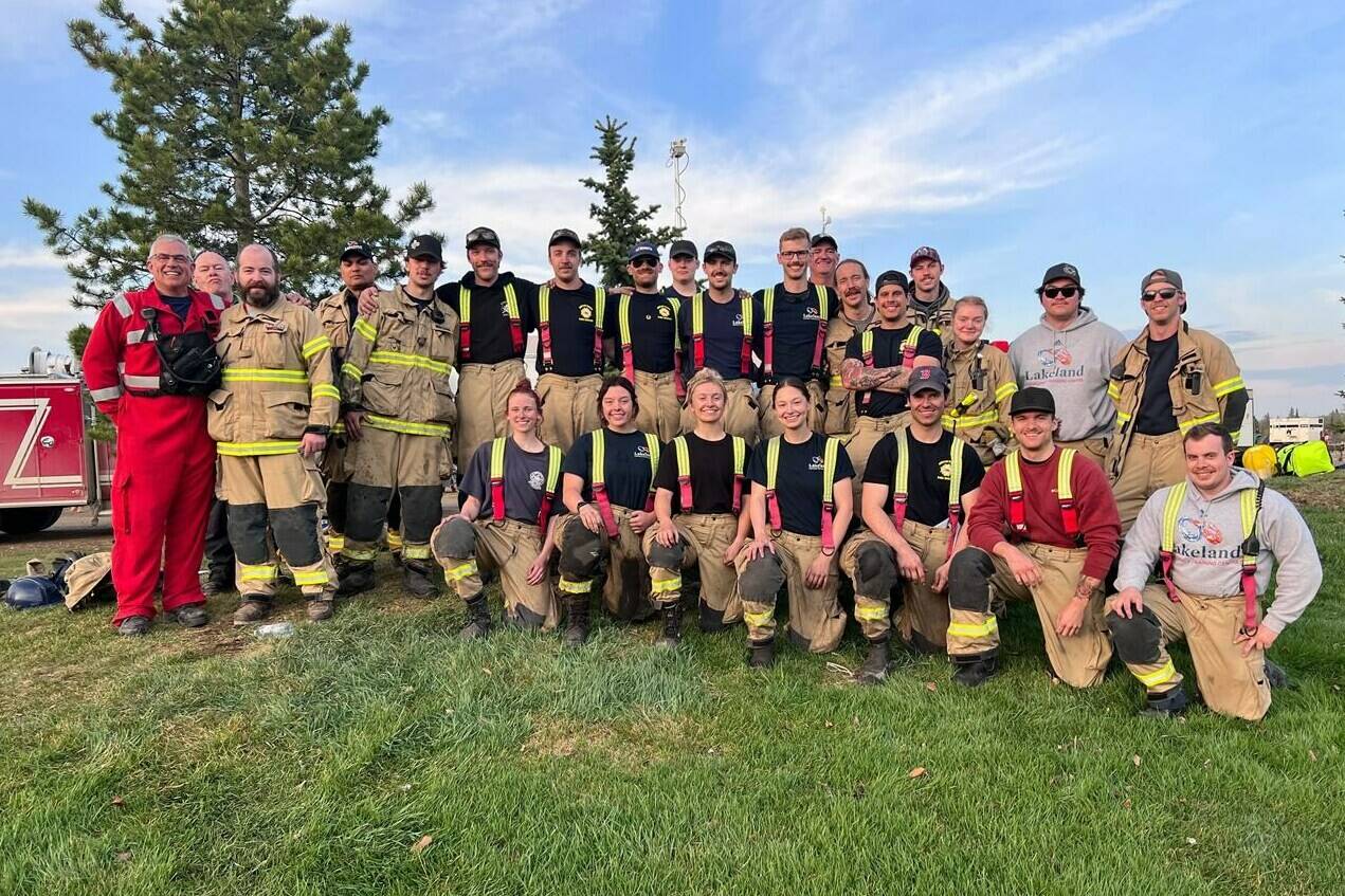 Lakeland College firefighter training students and staff pose in this undated handout photo. THE CANADIAN PRESS/HO, Lakeland College