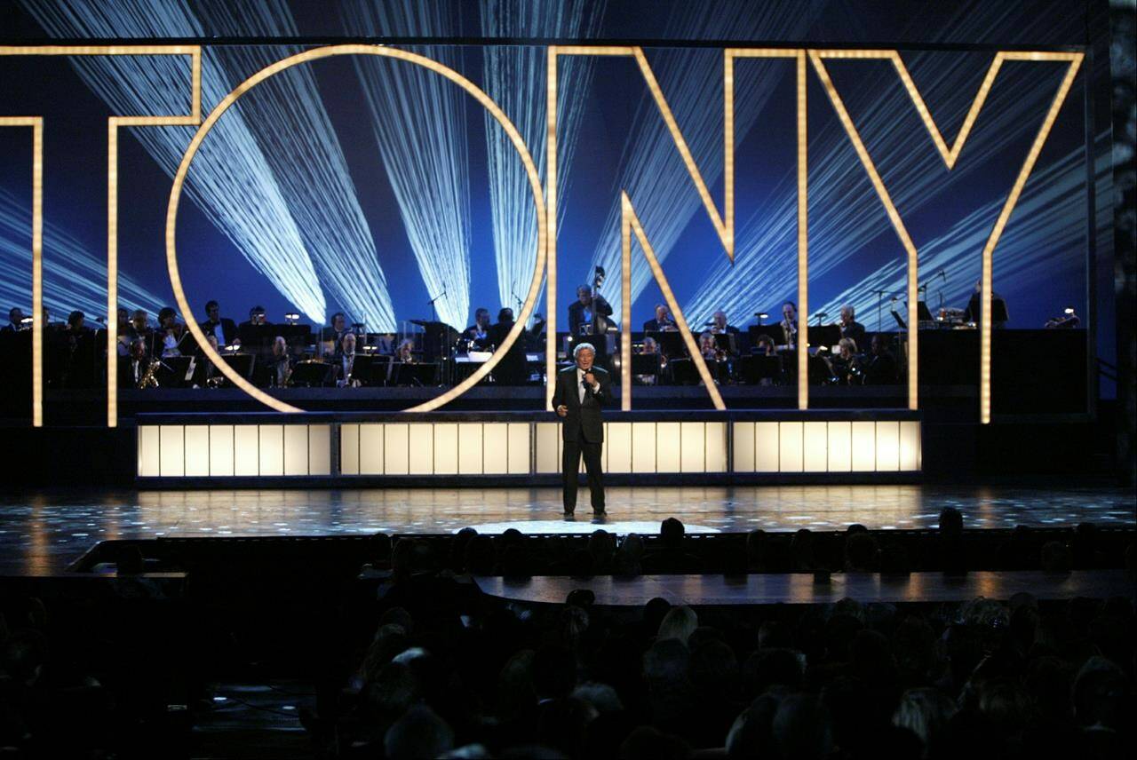 FILE - Singer Tony Bennett performs during the 58th Annual Tony Awards Sunday, June 6, 2004, at New York’s Radio City Music Hall. (AP Photo/Kathy Willens, File)
