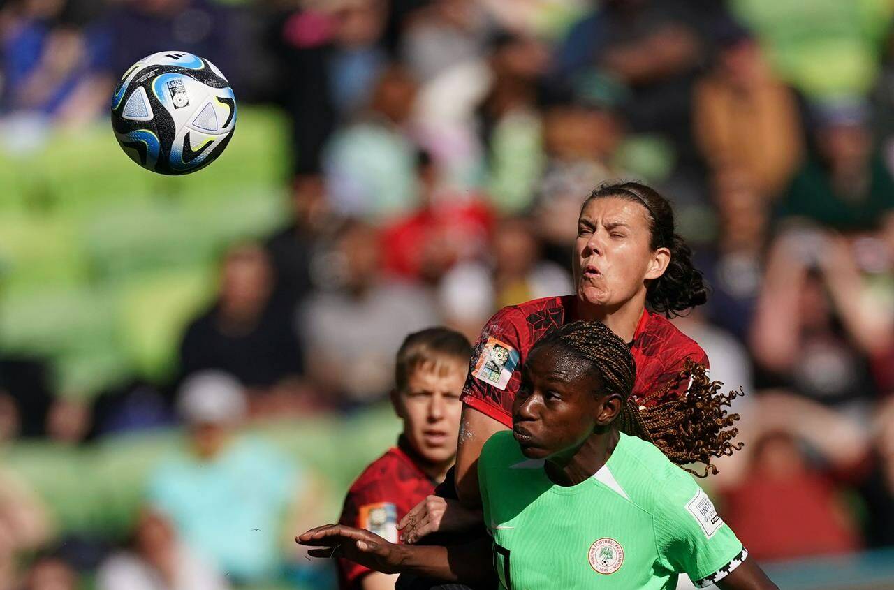 Canada's Christine Sinclair battles for the ball with Nigeria's Christy Ucheibe during first half Group B soccer action at the FIFA Women's World Cup in Melbourne, Australia, Friday, July 21, 2023. THE CANADIAN PRESS/Scott Barbour