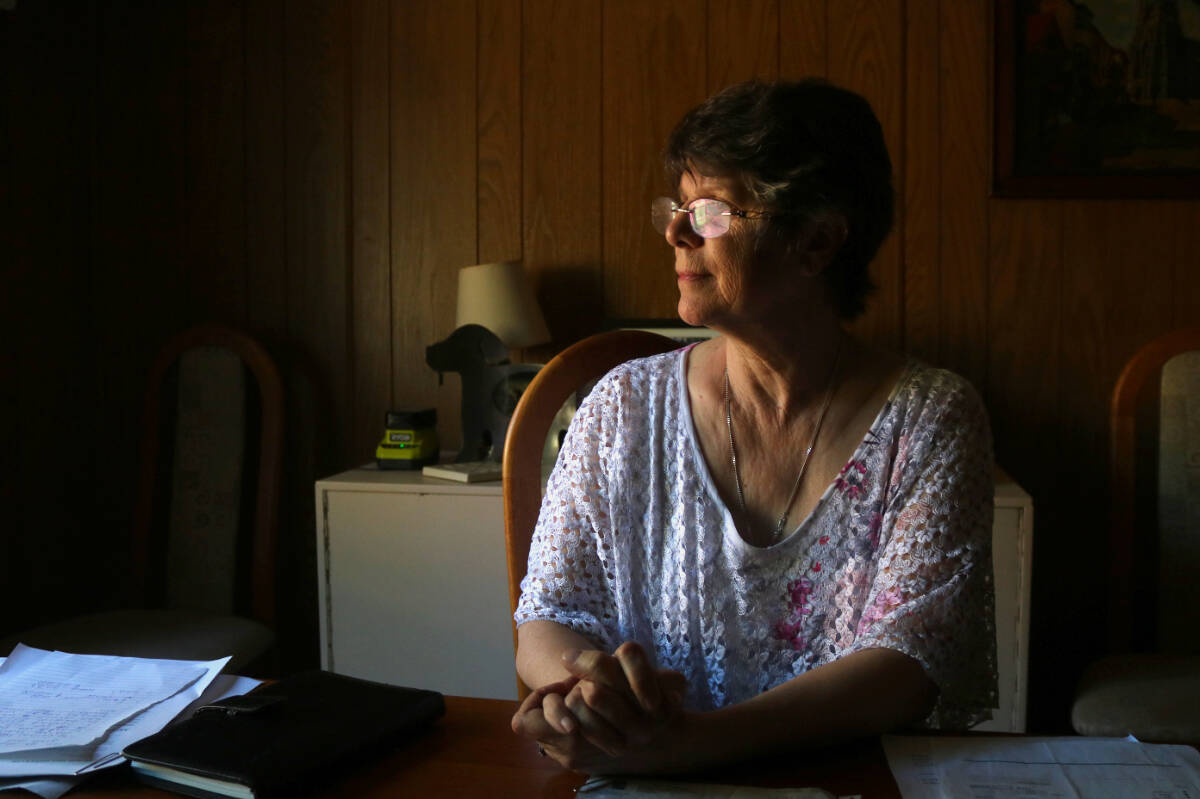 Hidden Valley Mobile Home Park resident Kate Cowan paid for an arborist to produce a report, which recommended the trees come down. (Bailey Moreton/News Staff)