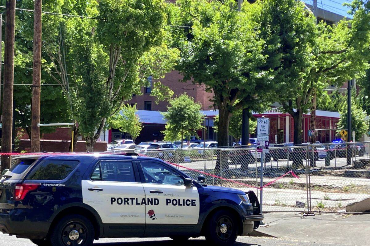Portland Police respond to a shooting at the Legacy Good Samaritan Medical Centre in Portland, Oregon. (Maxine Bernstein/The Oregon via AP)