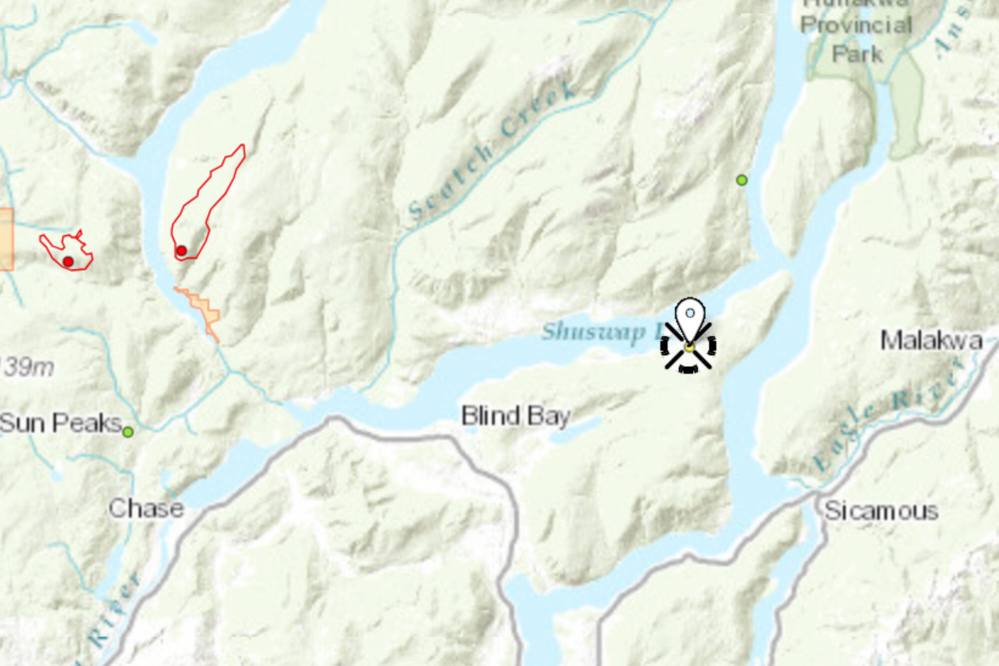 The map shows the Eagle Bay wildfire, now under control, to the right and the out of control Lower East Adams Lake and Bush Creek East fires in red on the left. (BCWS)