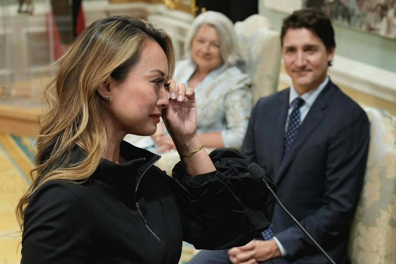 Prime Minister Justin Trudeau and Gov.-Gen. Mary Simon look on as an emotional Rechie Valdez is sworn in as Small Business Minister during a cabinet shuffle, Wednesday, July 26, 2023 in Ottawa. Valdez, who made history this week when she became the first Filipino-Canadian woman named to the federal cabinet, took an unusual path to high political office, transitioning from banking to baking to Parliament. THE CANADIAN PRESS/Adrian Wyld