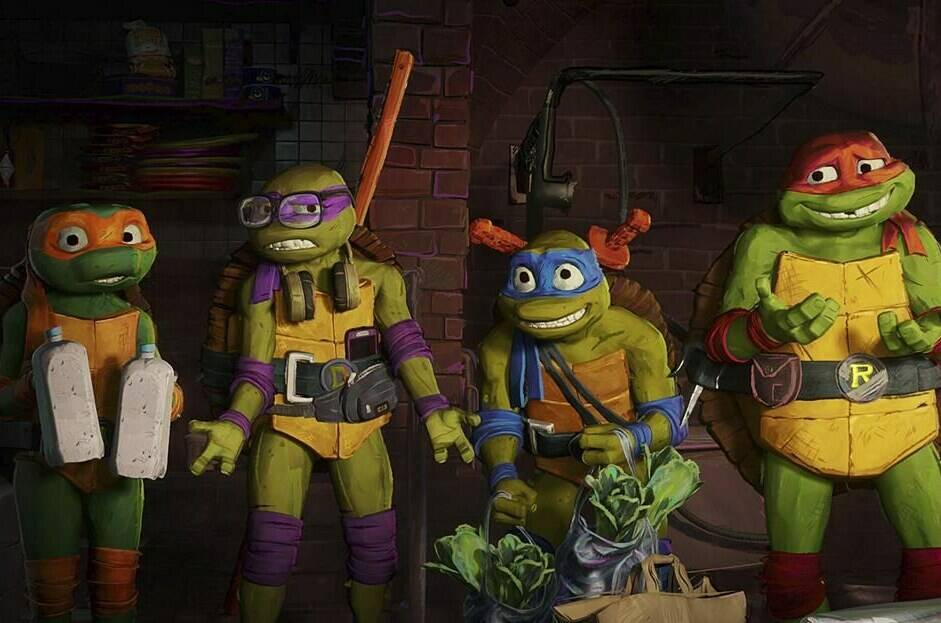 This image released by Paramount Pictures shows, from left, Michelangelo “Mikey”, voiced by Shamon Brown Jr., Donatello, “Donnie” voiced by Micah Abbey, Leonardo “Leo”, voiced by Nicolas Cantu and Raphael “Raph”, voiced by Brady Noon in a scene from “Teenage Mutant Ninja Turtles: Mutant Mayhem.” (Paramount Pictures via AP)