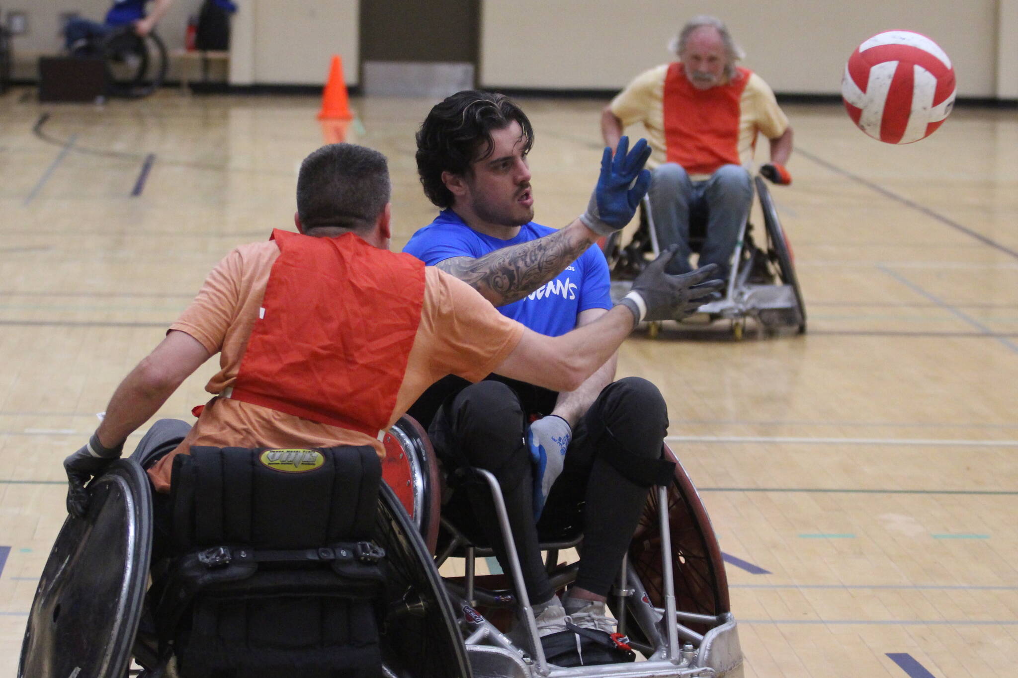 Airdrie’s Ryan Straschnitzki makes a pass during the wheelchair rugby jamboree in Penhold, Alberta, in June, hosted by the Red Deer Reapers. (Photo by Ian Gustafson/ Advocate staff)
