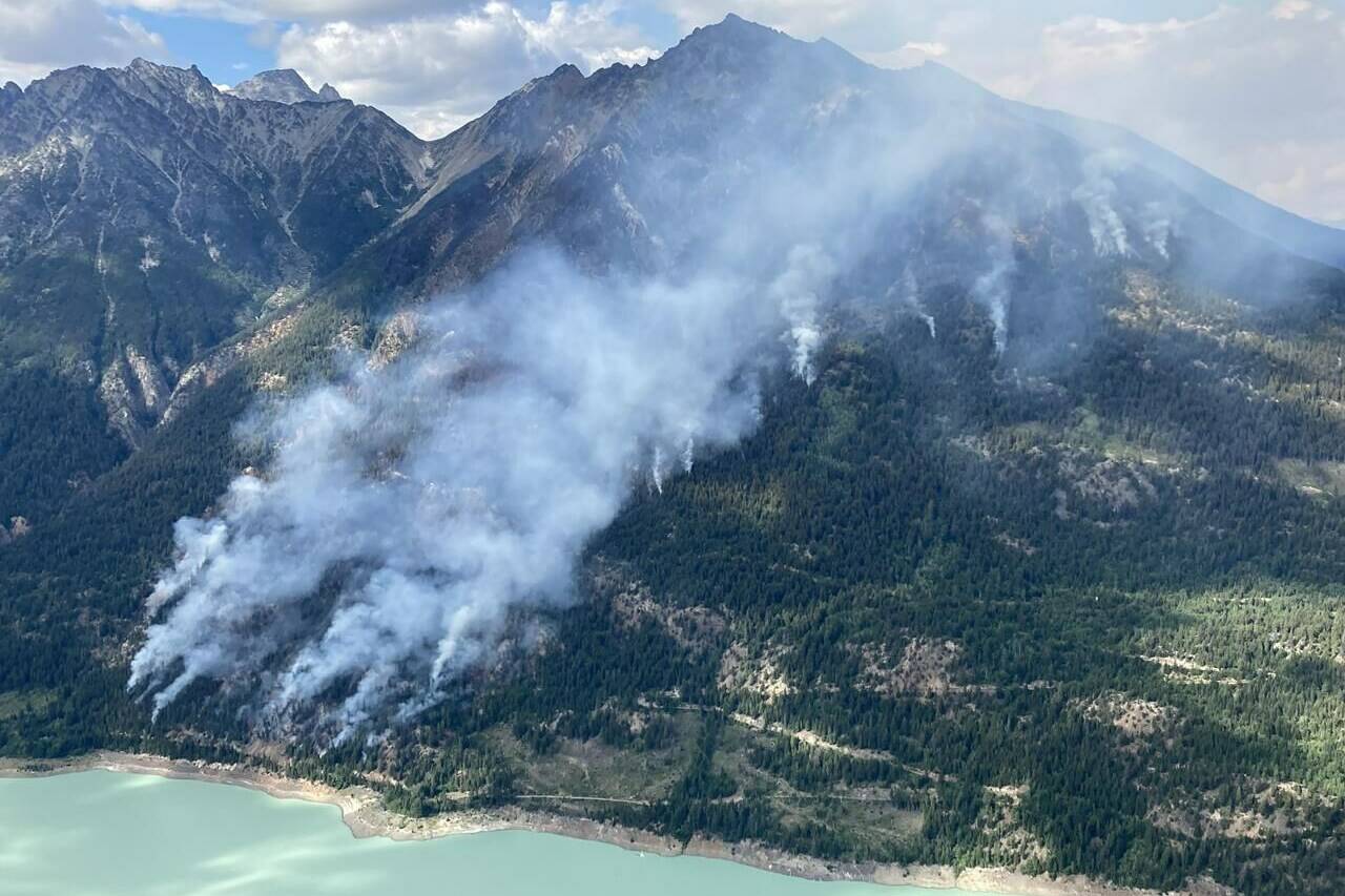The Downton Lake wildfire northwest of Whistler, B.C., burns in this recent handout photo. THE CANADIAN PRESS/HO, BC Wildfire Service