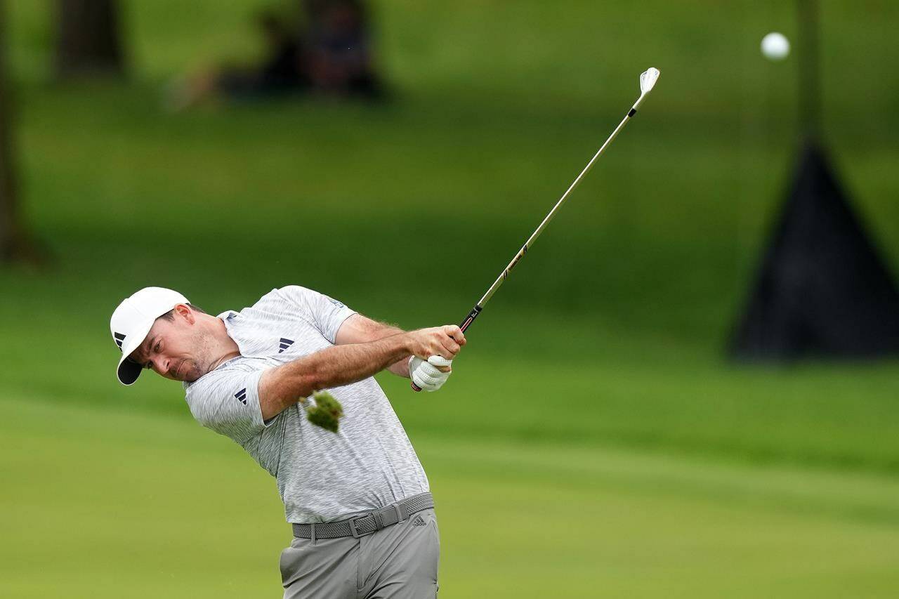 Nick Taylor was exhausted after his three-round playoff where he edged out Tommy Fleetwood to win the RBC Canadian Open. Taylor makes an approach shot on hole 6 during final round Canadian Open golf championship action in Toronto, Sunday, June 11, 2023. THE CANADIAN PRESS/Nathan Denette