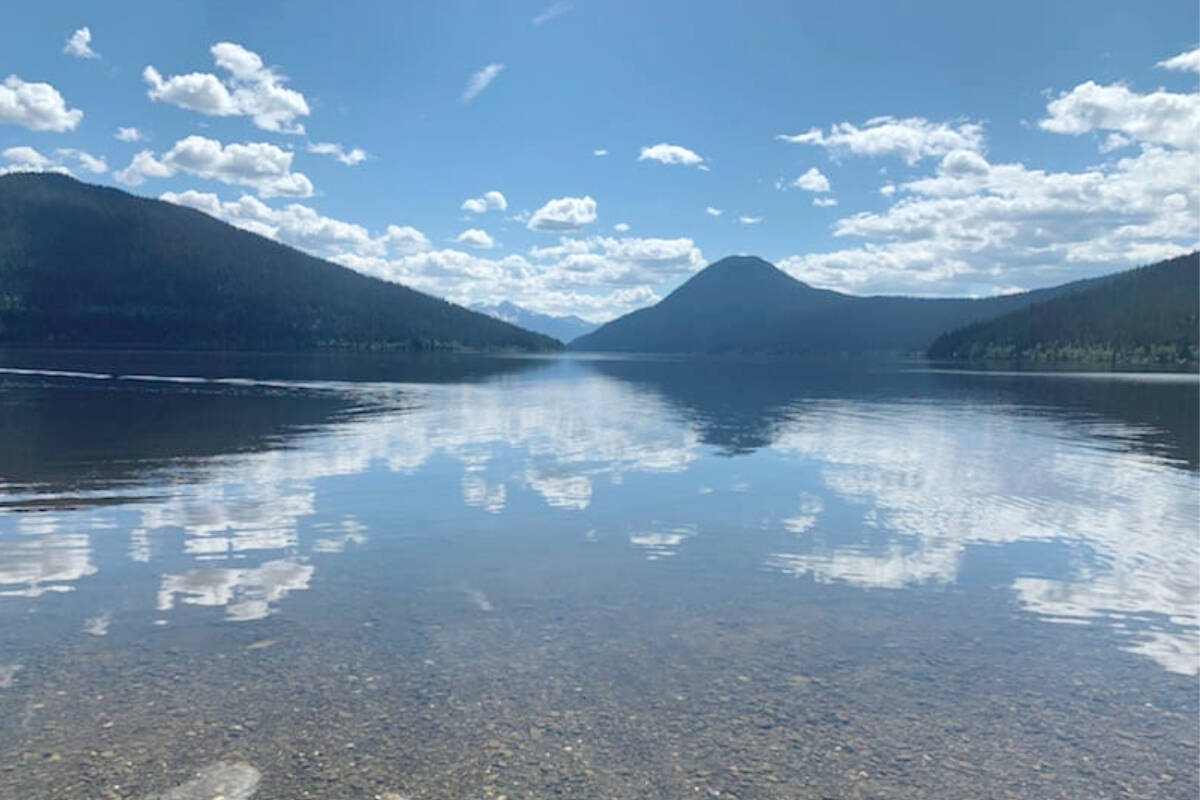 Clouds reflect in the water of Bowron Lake. (Tracey Roberts photo)
