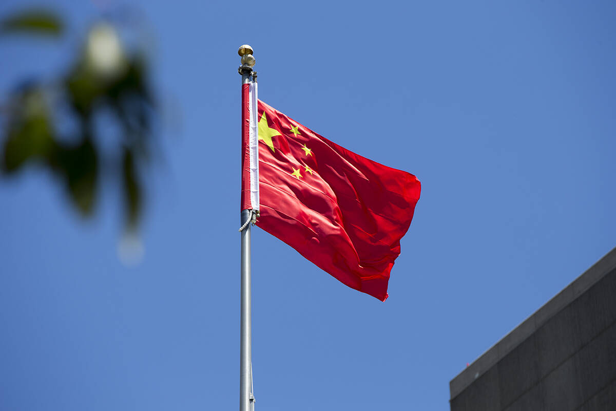 The flag of the nation of China flies over the S.F. Chinese consulate at Laguna Street and Geary Boulevard on Thursday, July 23, 2020. Rain continued to pelt northeastern China in the wake of Typhoon Doksuri Saturday (Aug. 5), as authorities reported more fatalities and missing people while evacuating thousands more. (Kevin N. Hume/S.F. Examiner)